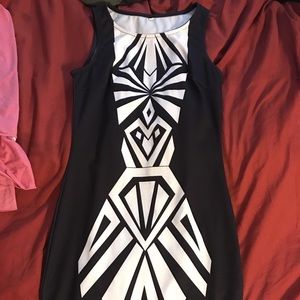 Sleeveless fitted mid length black and white dress